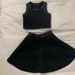 Girls Miss Behave two piece (top & skirt). Black